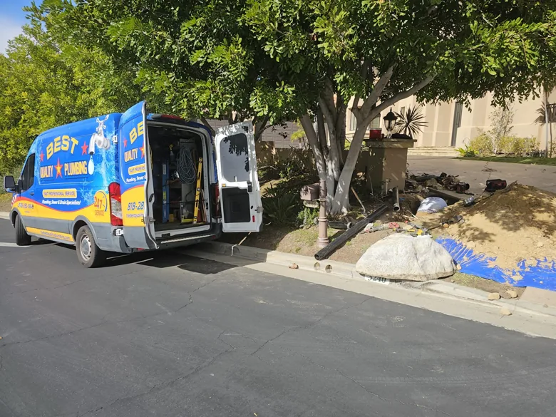 Company van beside protected curbside excavation
