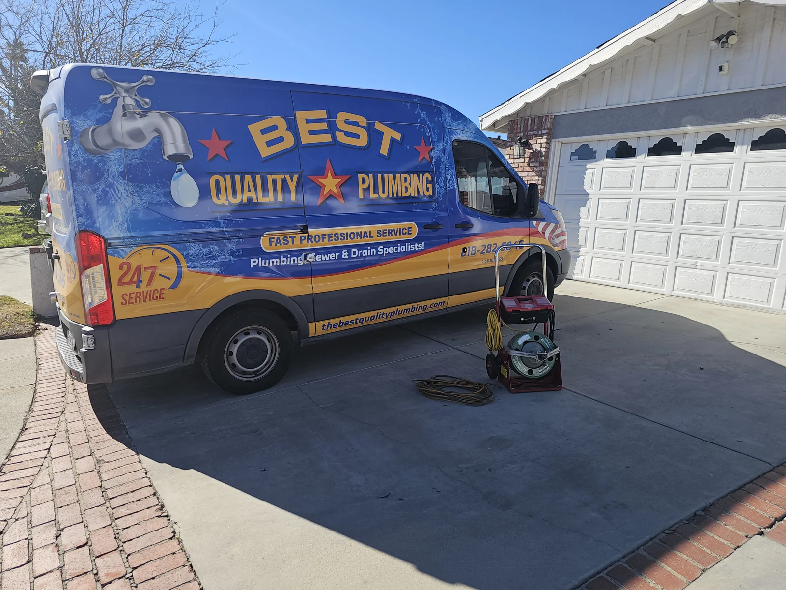 Best Quality Plumbing van and drain equipment on a residential driveway